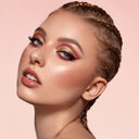 acconciatura con treccine