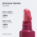 A pink bottle of Peptize My Lips - Burro Labbra con Peptidi Volumizzante Idratante with glossy pink cream on the applicator. Text: Efficacia Testata / Tested. +35 plumping after 15 min, +42 hydration after 12h. Test details in small print.