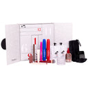 A selection of Diego dalla Palma Milano Beauty Manifesto - Calendario dell’Avvento beauty products, brushes, and makeup items arranged in front of a white, numbered advent calendar box with red and gray accents.