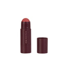 A blush stick with a rounded pink top stands upright next to its matching cap, highlighting its sleek burgundy design. The tube displays “Diego dalla Palma” printed vertically, while the Too Much Attention - Stick Guance In Crema promises an incarnato luminoso and a touch of creamy blush for radiant cheeks.