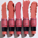 Five ALL IN ONE - BLUSH sticks in different shades and textures are displayed, each with a swatch of color above the product on a white background. These versatile ALL IN ONE - BLUSH options are perfect for anyone looking for a practical blush multiuso to enhance their make up viso routine.
