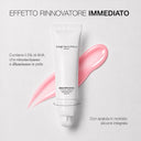 Un tubetto di Maschera Esfoliante AHA 5 di Diego dalla Palma con una macchia rosa su sfondo bianco, su cui è riportata una scritta in italiano che sottolinea il contenuto del 5 di AHA per un “rinnovamento immediato”. Questa maschera esfoliante per il viso garantisce risultati immediati e include una spatola morbida in silicone integrata.